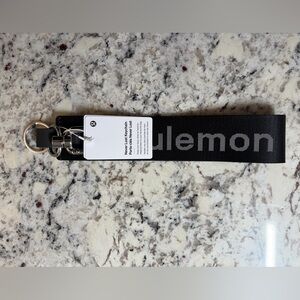 Lululemon Athletica Black Keychain with Silver Accents